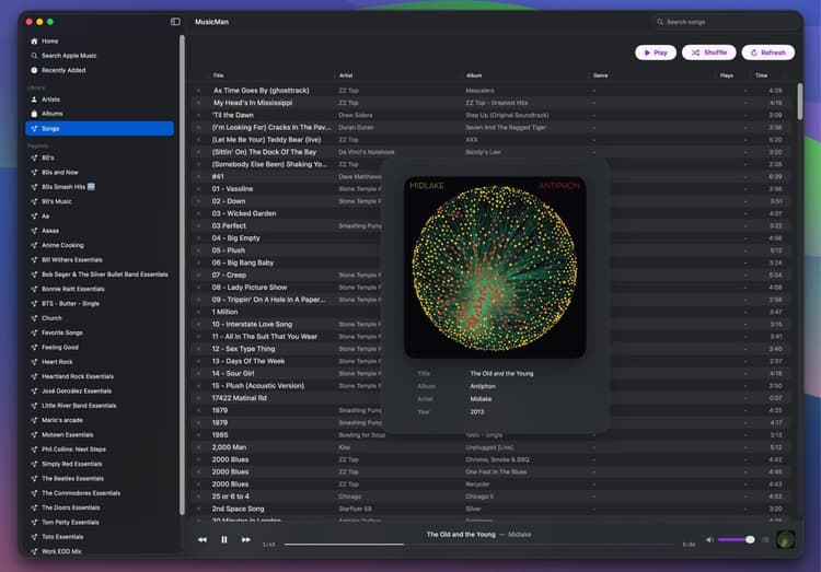 Lastly the Songs View of JüK, with a modal that shows the metadata for the song currently playing, accessed by clicking the thumbnail of the album artwork in the player.